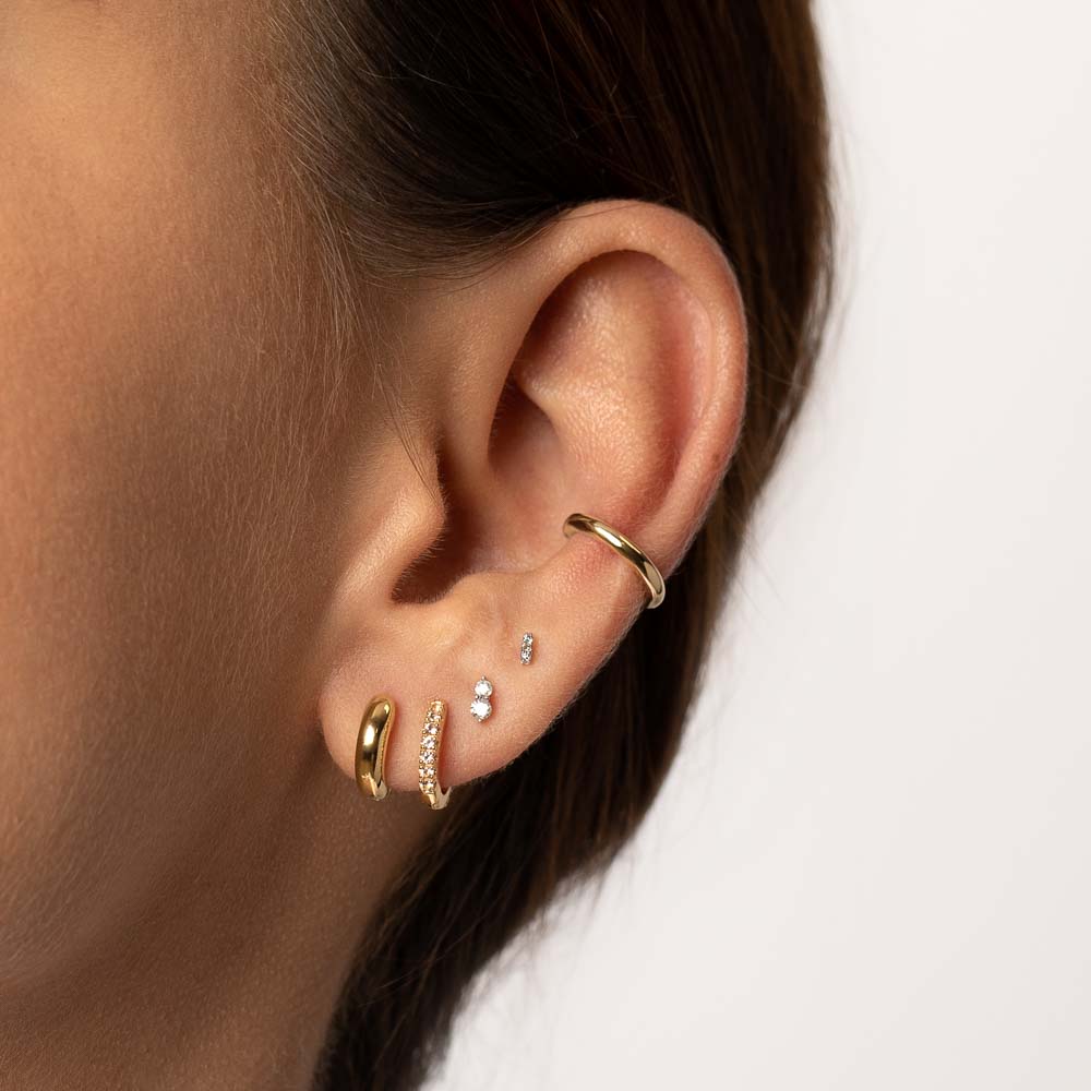 Medley Earrings Midi Huggie Earrings  in Gold
