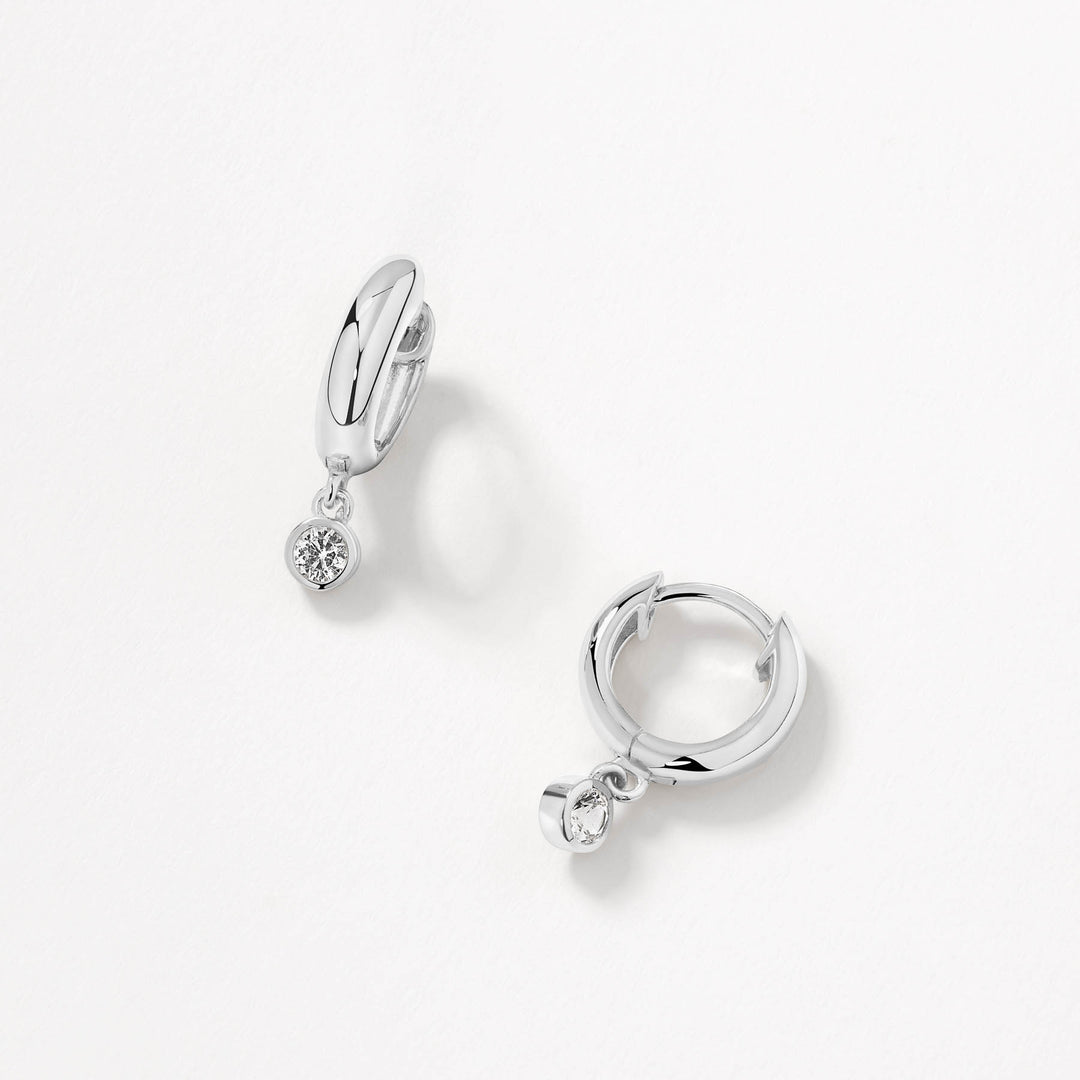 Medley Earrings White Topaz Round Drop Charm Huggies in Silver