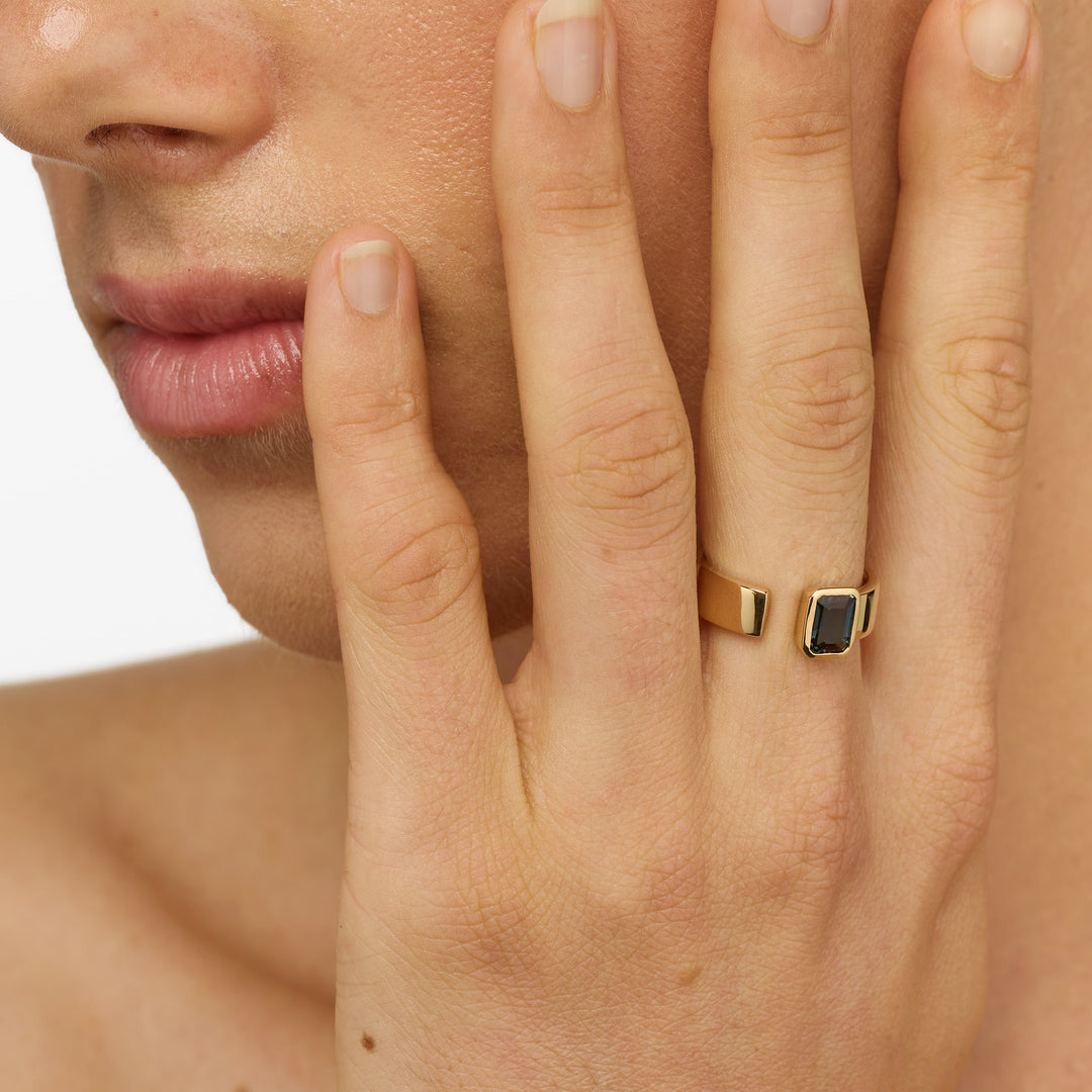 Blue Topaz Open Bezel Cigar Band in Gold