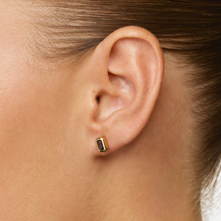 Blue Topaz Emerald Cut Stud Earrings in Gold