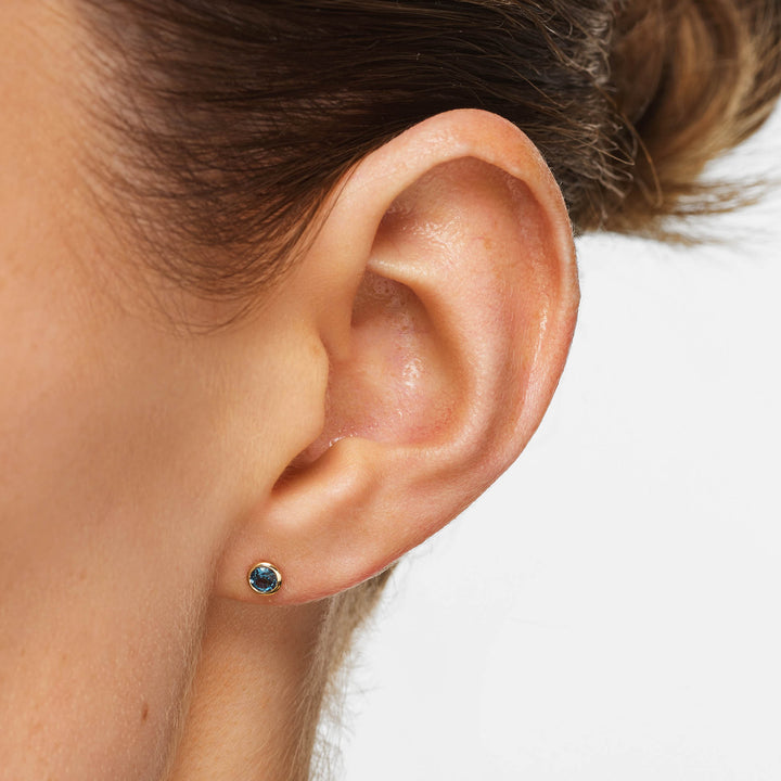 Blue Topaz Bezel Stud Earrings in 10k Gold