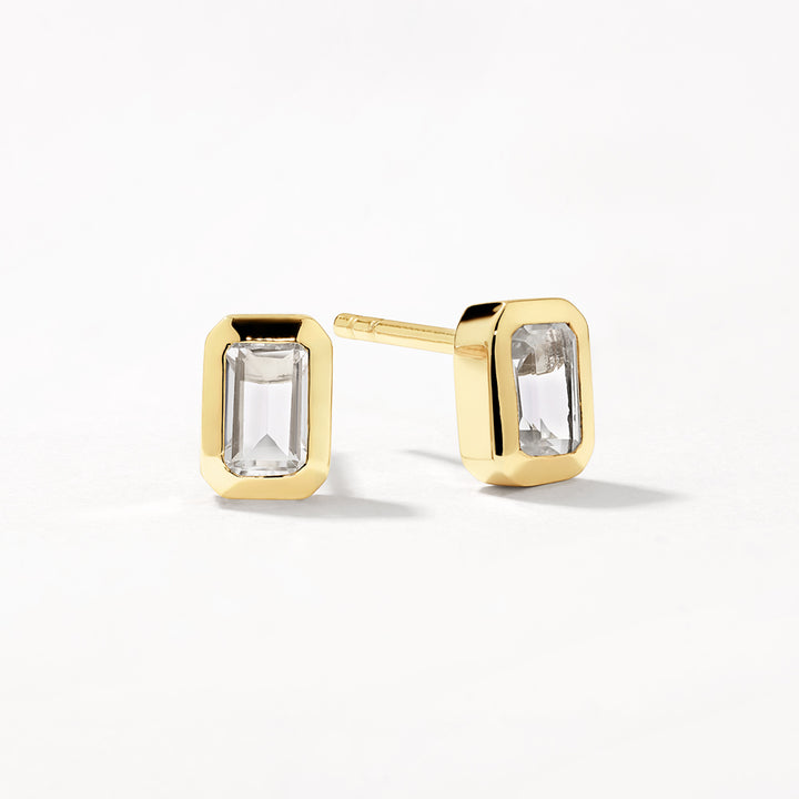 White Topaz Emerald Cut Stud Earrings in Gold