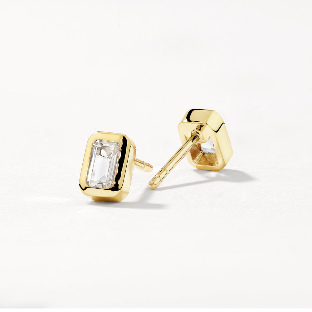 White Topaz Emerald Cut Stud Earrings in Gold