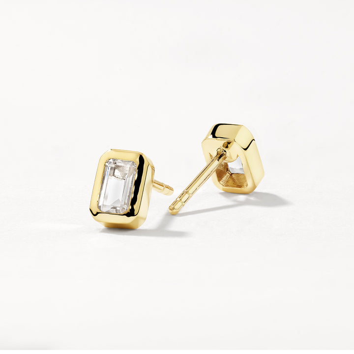 White Topaz Emerald Cut Stud Earrings in Gold