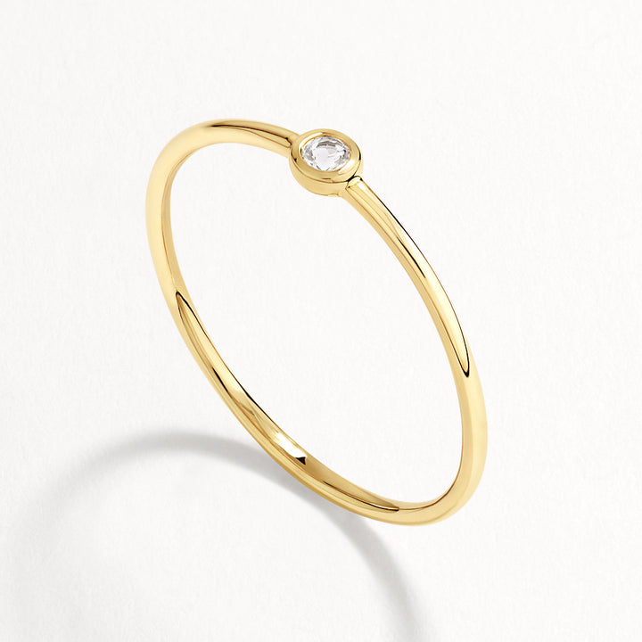 Micro White Topaz Round Bezel Ring in 10k Gold