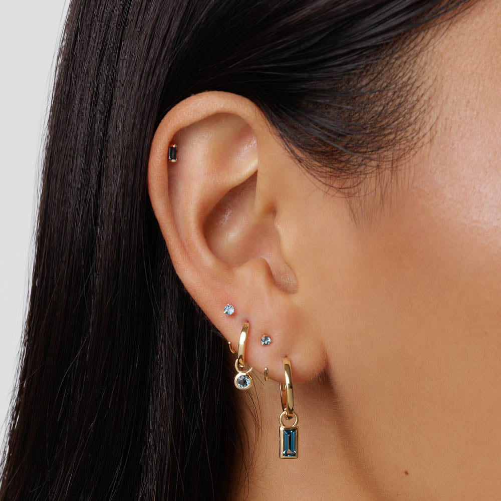 Medley Earrings Blue Topaz Baguette Helix Single Stud Earring in 10k Gold
