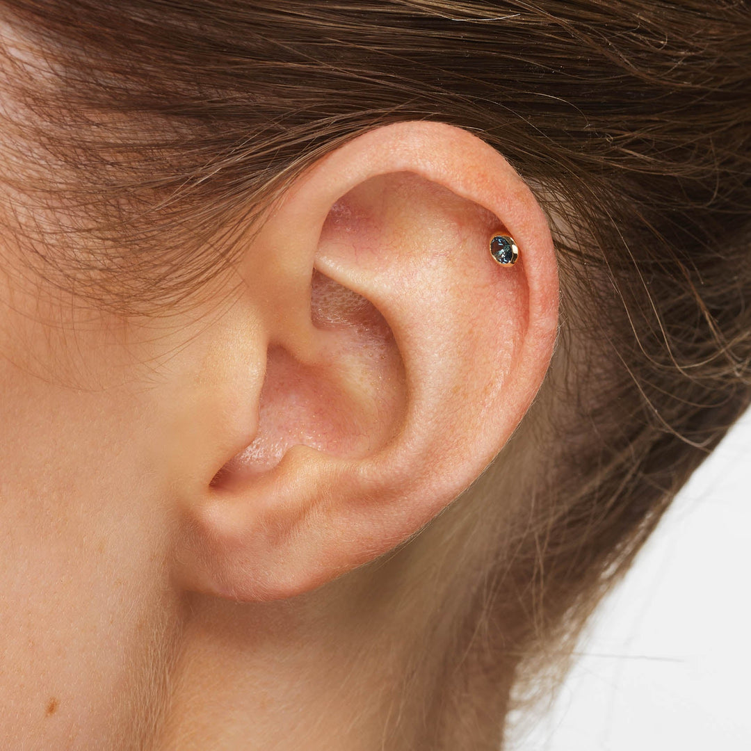 Medley Earrings Blue Topaz Bezel Helix Single Stud in 10k Gold