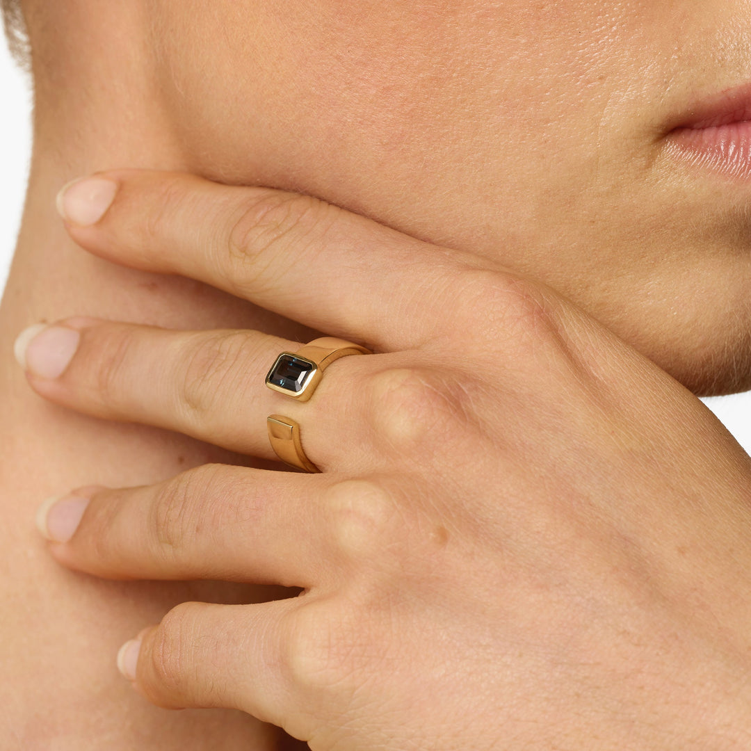 Medley Ring Blue Topaz Open Bezel Cigar Band in Gold