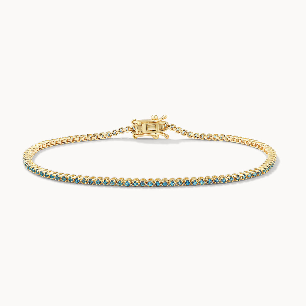 Medley Bracelets/Bangle Blue Topaz Tennis Bracelet in 10k Gold