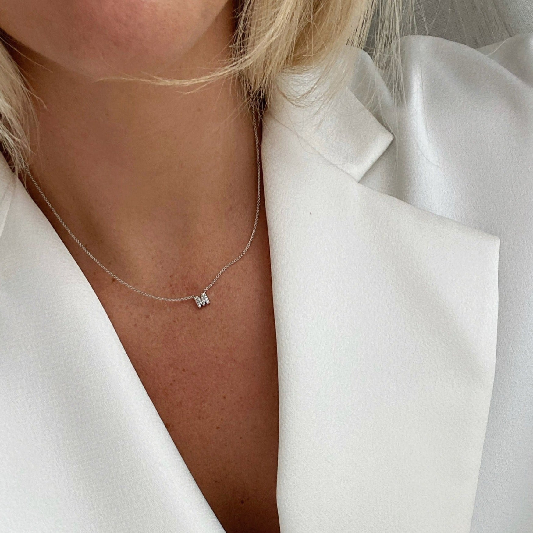 Elsa Peretti® Alphabet Letter M Pendant in Silver with Diamonds, Small |  Tiffany & Co.