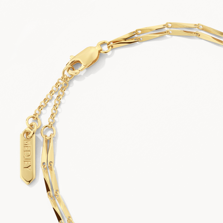 Double Twist Bar Link Chain Bracelet in Gold