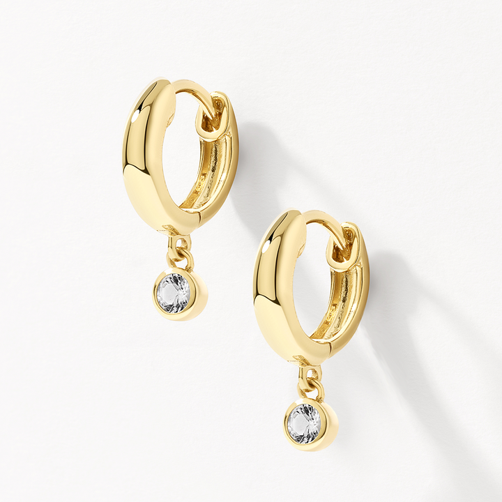 Medley Earrings White Topaz Round Drop Charm Huggies in Gold